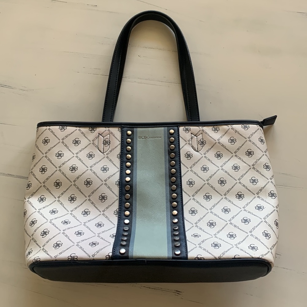 BCBG white and black leather purse with green stripe